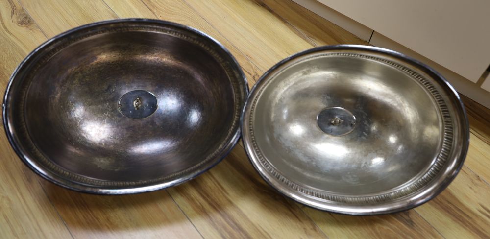 A pair of Victorian silver plated meat domes